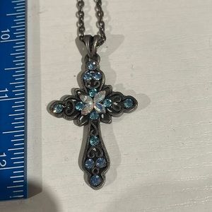 Cross necklace with blue gems